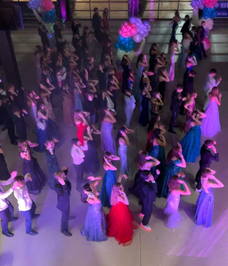 Professional photo booth attendants managing a well-organized event in Dallas