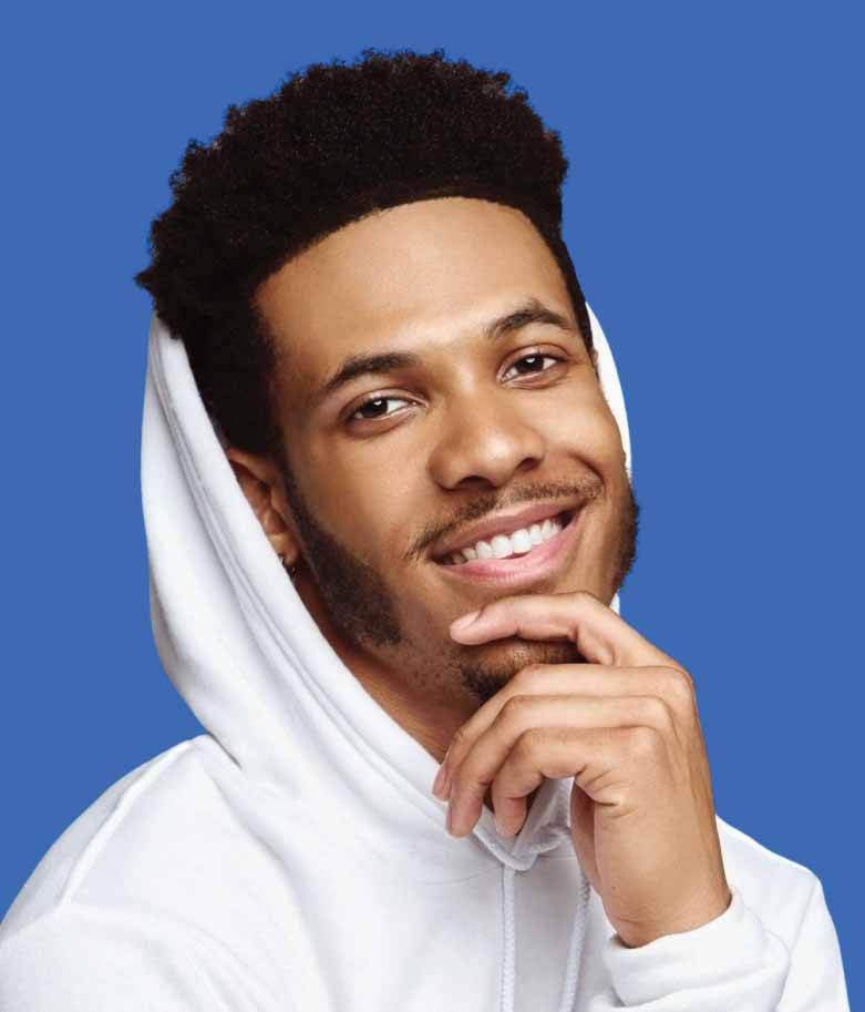 Professional DJ and MC engaging guests at a corporate or wedding event with high-energy music and professional hosting