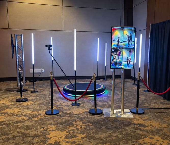 360 photo booth rental Dallas capturing slow-motion video at a high-energy event<br />
