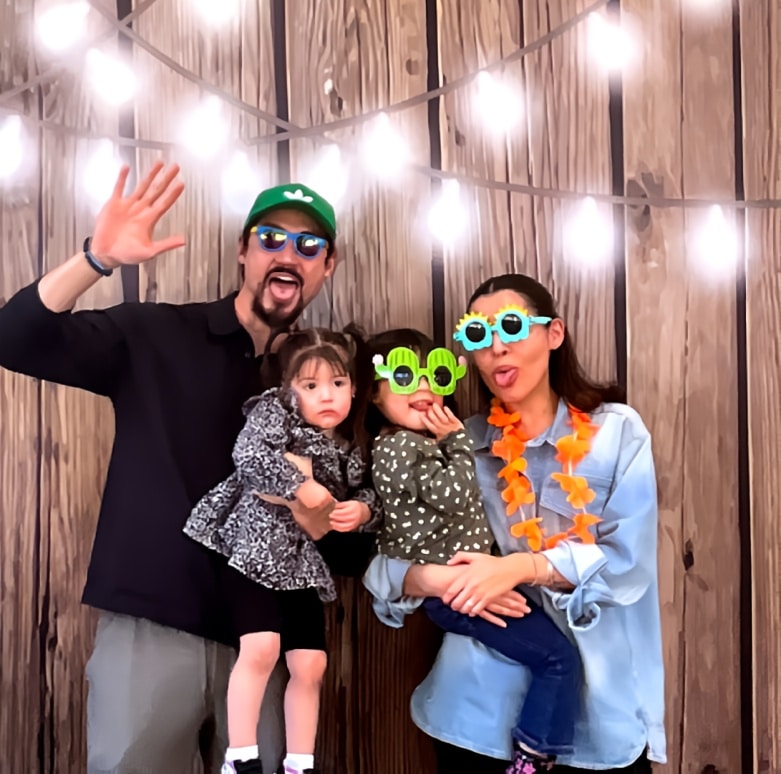 Professional DJ and MC engaging guests at a corporate or wedding event with high-energy music and professional hosting