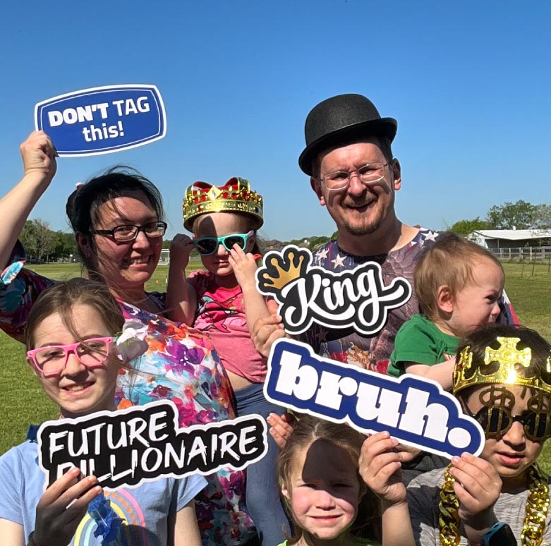 Professional DJ and MC engaging guests at a corporate or wedding event with high-energy music and professional hosting