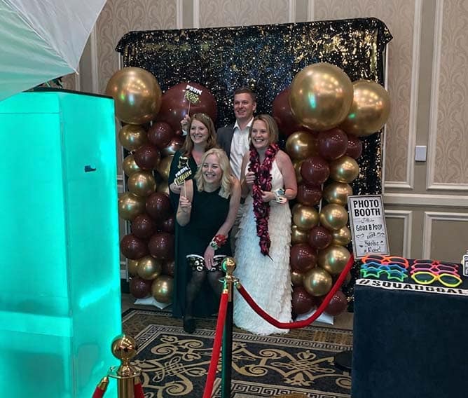 Color changing photo booth in Dallas with customizable LED lighting at an event