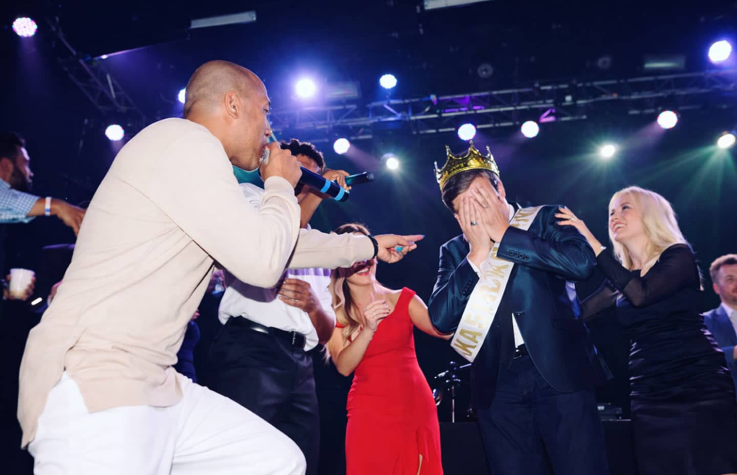 Professional corporate event DJ providing music and MC services at a Fort Worth business event