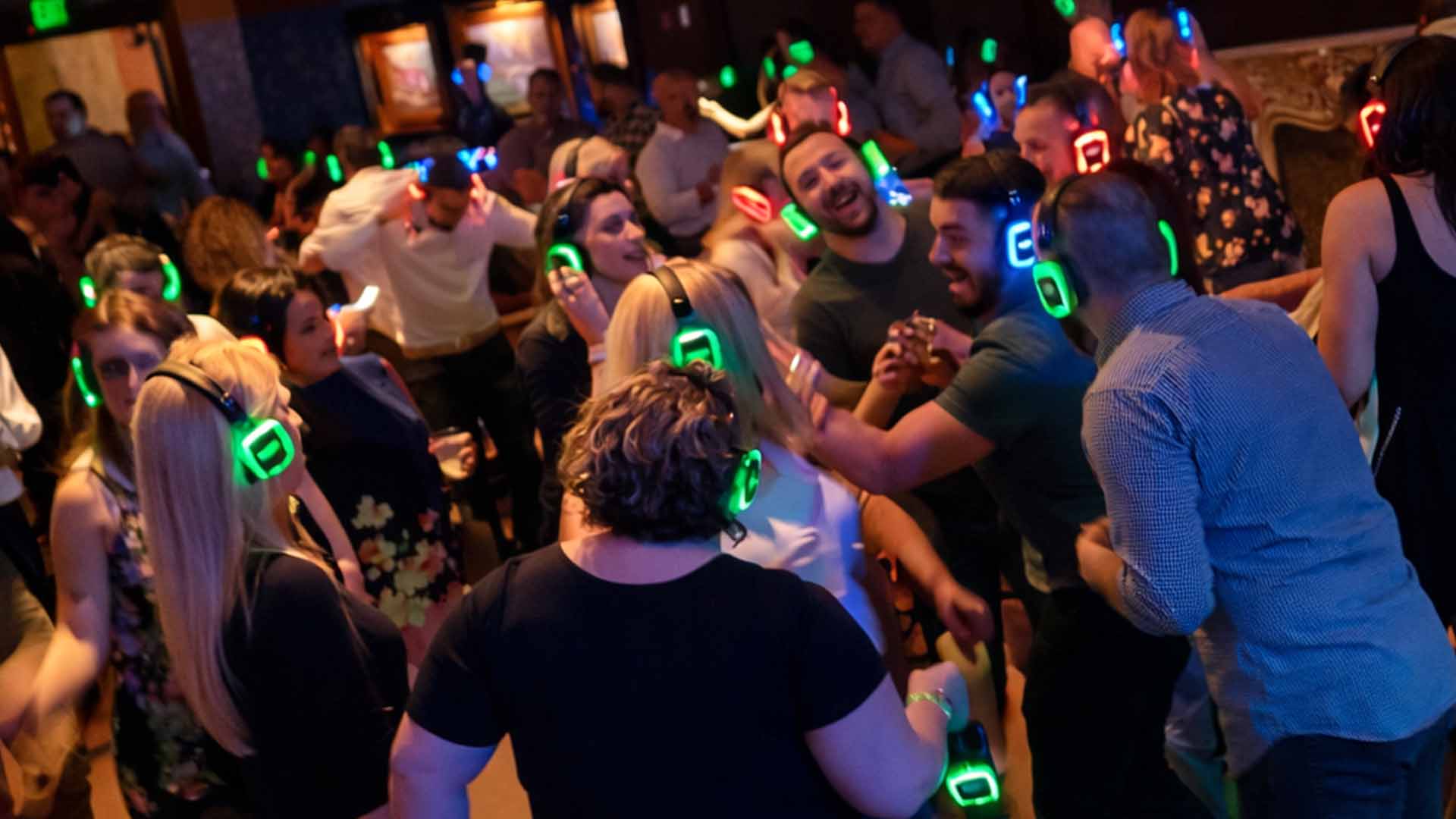 Professional event entertainment services across Dallas–Fort Worth featuring DJs, photo booths, silent disco, interactive games, and AV equipment.