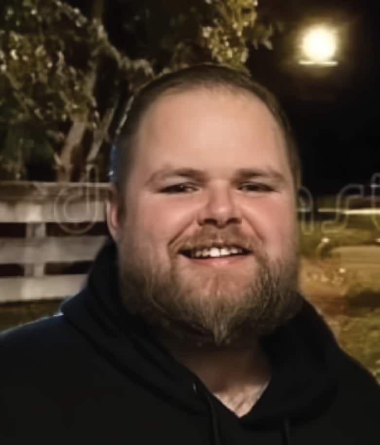 Professional DJ and MC engaging guests at a corporate or wedding event with high-energy music and professional hosting