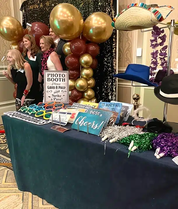 Professional photo booth attendants managing a well-organized event in Dallas