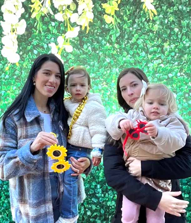 Photo booth at a Dallas school event with students enjoying interactive fun<br />
