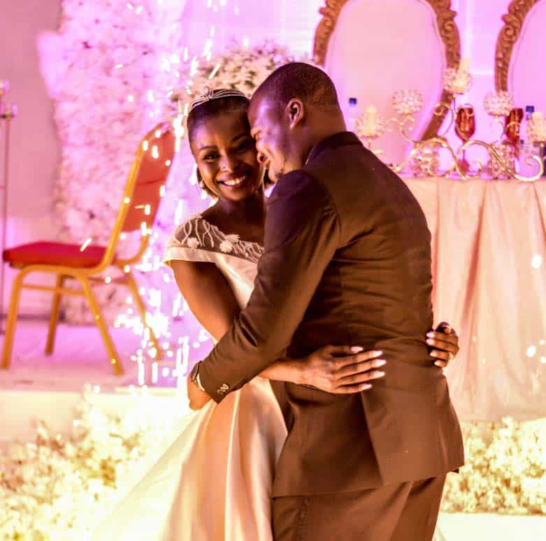 Southlake wedding couple enjoying a reception with a professional DJ providing elegant music, polished MC services, and seamless entertainment