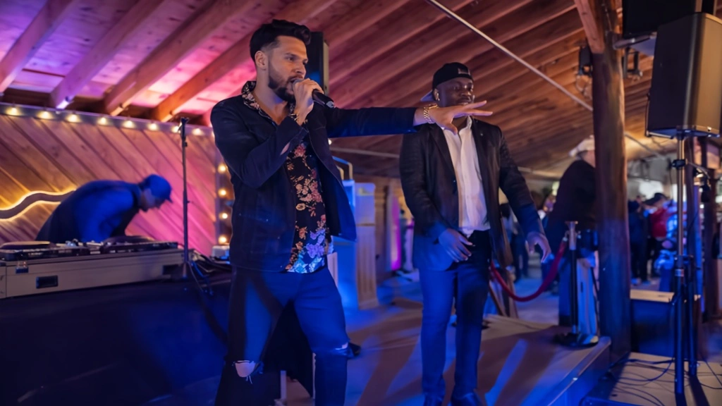 DJ hosting a high school prom illustrating how far in advance to book event entertainment