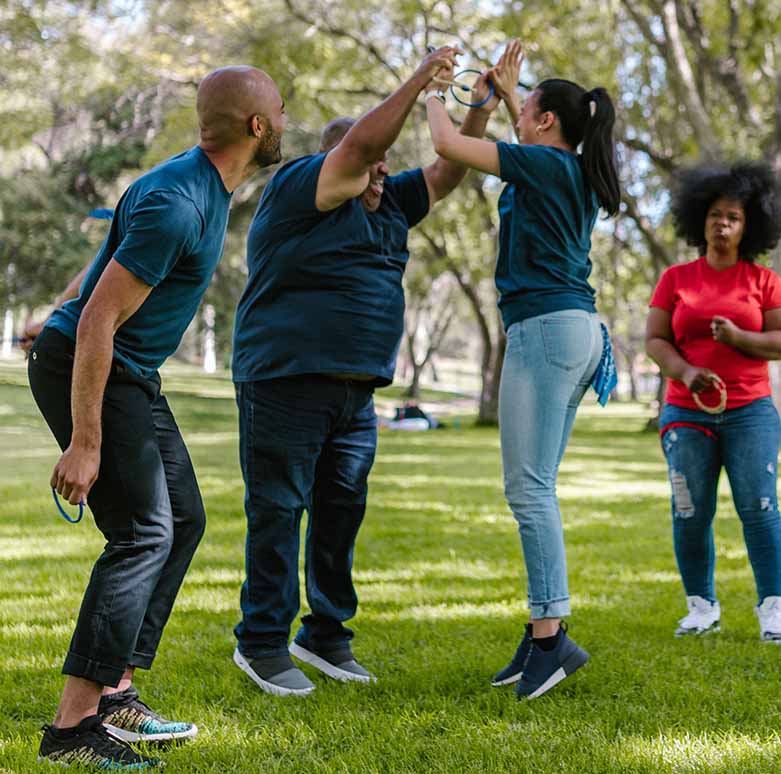 Employees working together during a corporate team building activity